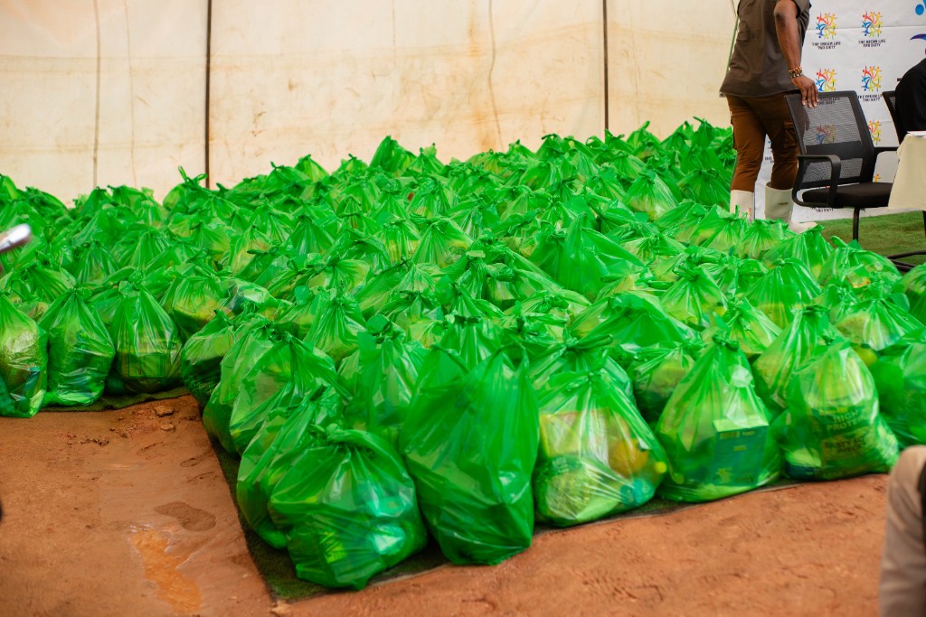 Rows of green Christmas hampers ready for elderly residents